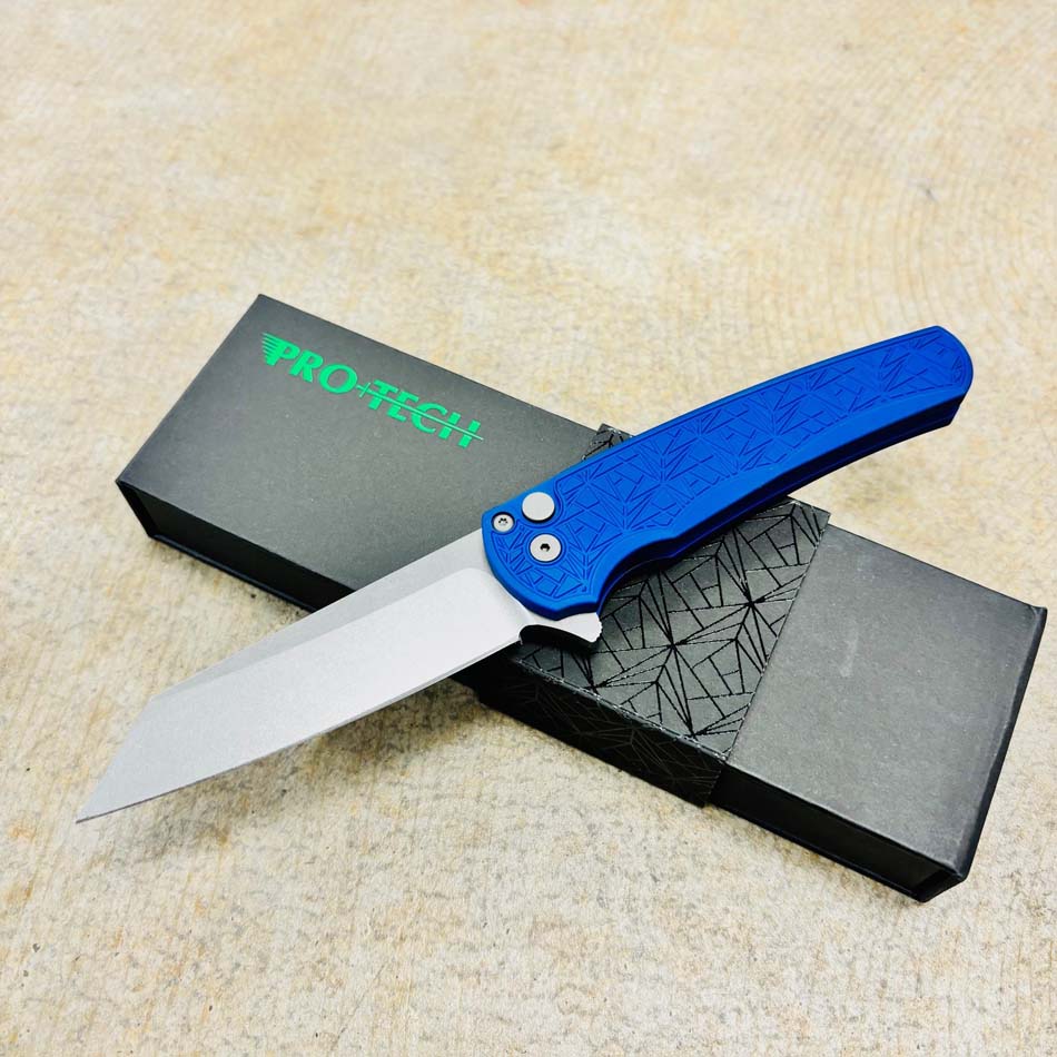 Protech 5405-BLUE Malibu NEXUS Textured Blue Handle, Stonewash Magnacut Reverse Tanto Blade Knife Protech Malibu NEXUS Textured Black Handle, Mother of Pearl Button, DLC Black Magnacut Wharncliffe Blade Knife BLADE SHOW 2024