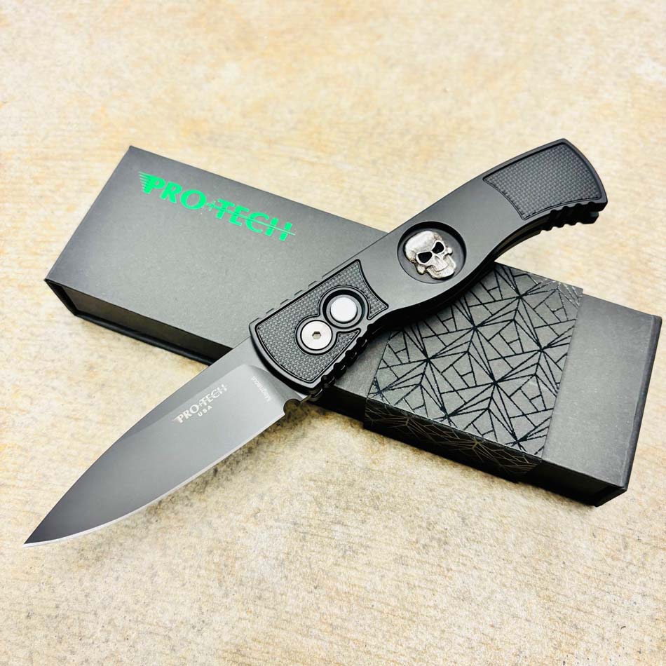 PROTECH TR-2 Skull Drop Point 3.0" DLC Black Magnacut Blade Auto Textured Black Handle with Sterling Silver Shaw Skull Knife PROTECH TR-2 Skull Drop Point 3.0" DLC Black Magnacut Blade Auto Textured Black Handle with Sterling Silver Shaw Skull Knife